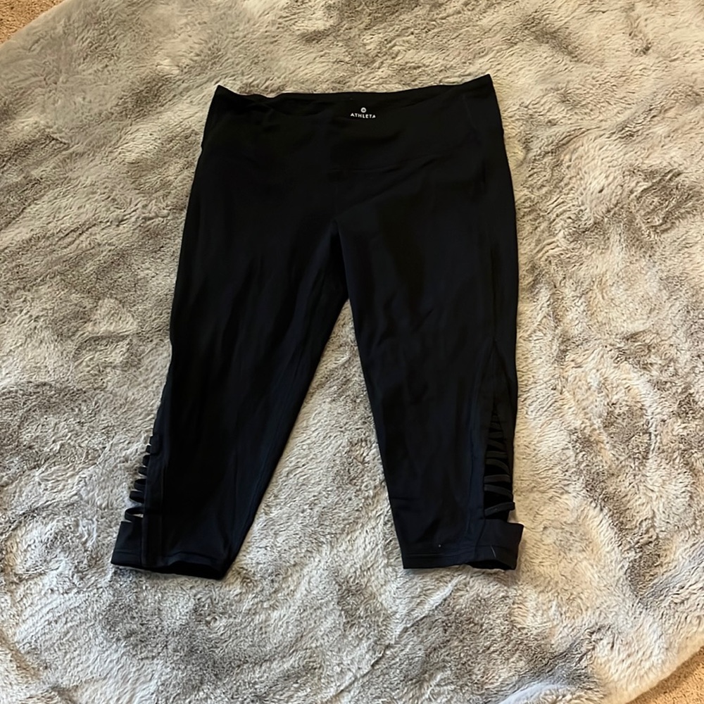 27. Athleta large petit capris with cut outs